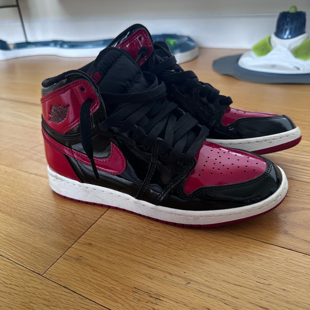 Jordan Women's Black and Red High-Top Sneakers